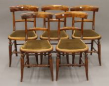 Five Victorian walnut bar back chairs. Each 42 cm wide.