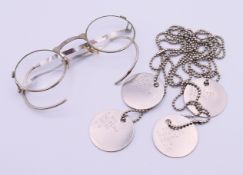 Two sets of dog tags, one set marked B POS 23740131 FRANKLIN D J OB,