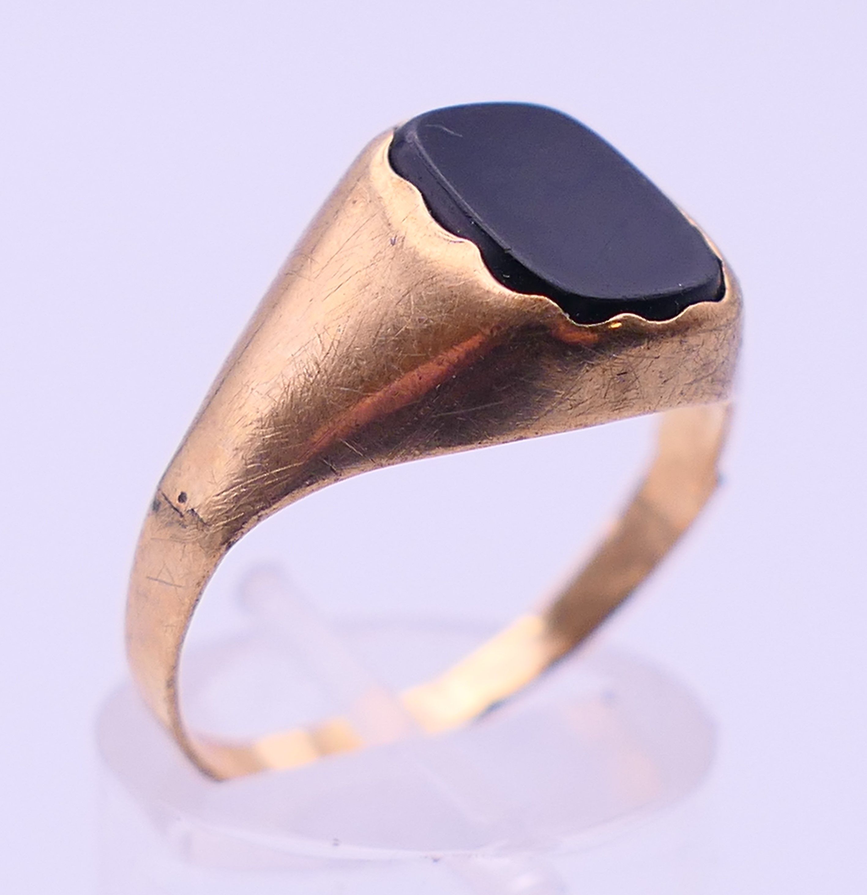 Two 9 ct gold rings, an unmarked gold signet ring and a pair of 9ct gold hoop earrings. - Image 14 of 19