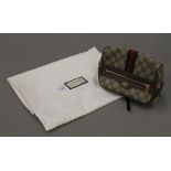 A Gucci belt bag. 20 cm wide.