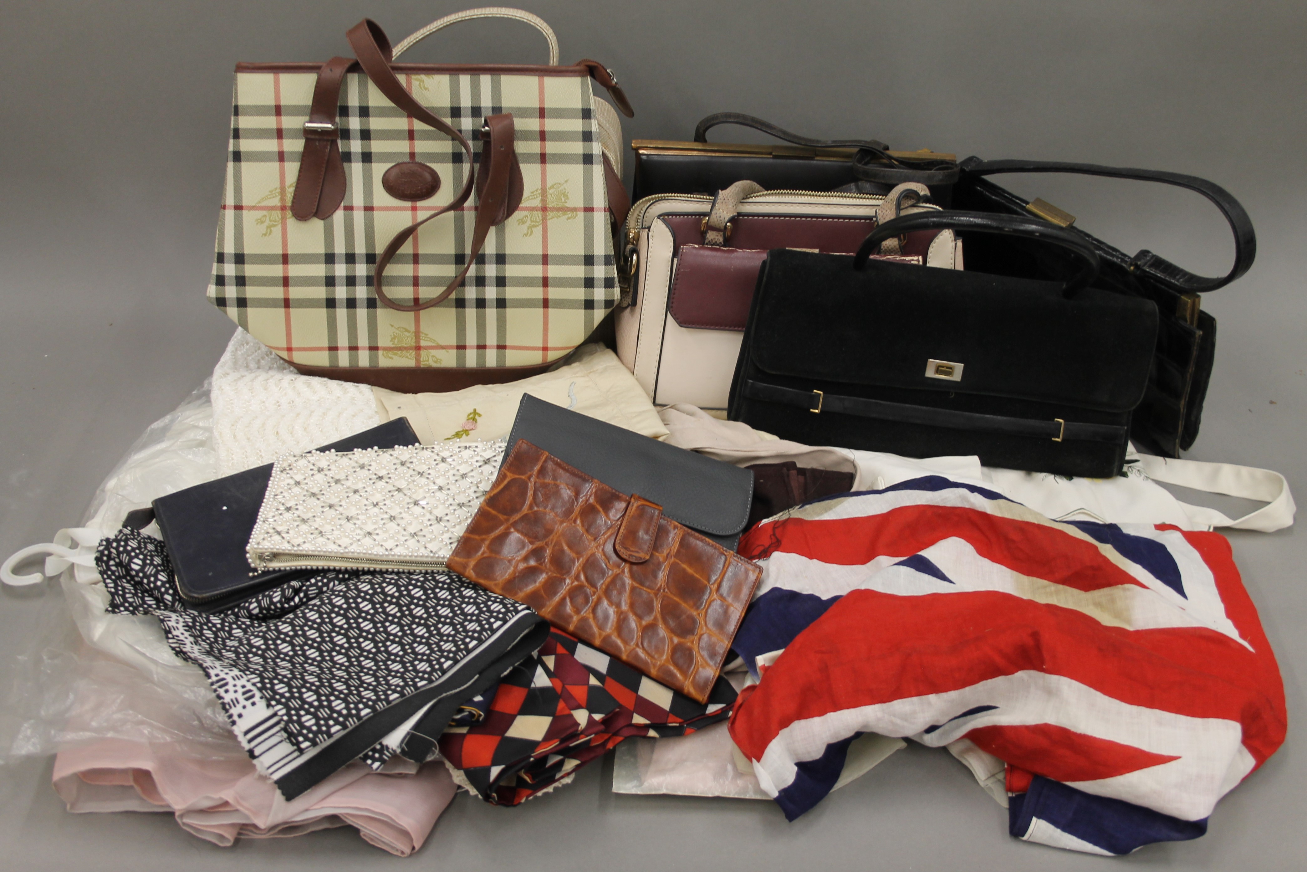 A quantity of various vintage handbags, linen, a Union flag etc. The latter 41 x 85 cm.