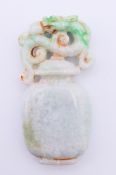 A jade dog-of-fo on an urn. 7.5 cm high.
