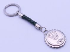 A boxed Rolex Basel World 2016 key ring. 13 cm high.