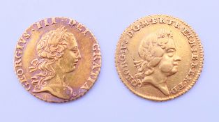 A George I 1718 gold one third Guinea coin and a George III 1762 gold one third Guinea coin.