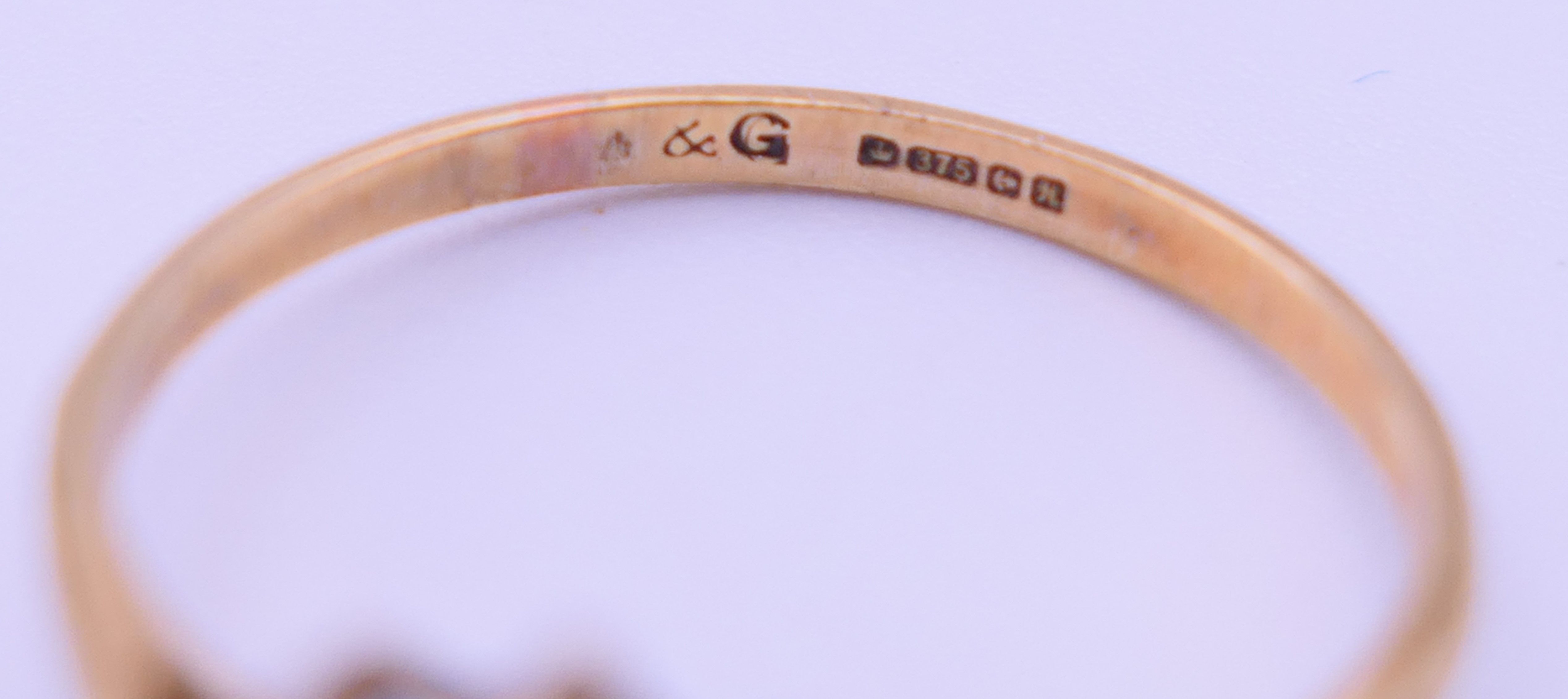 Two 9 ct gold rings, an unmarked gold signet ring and a pair of 9ct gold hoop earrings. - Image 10 of 19