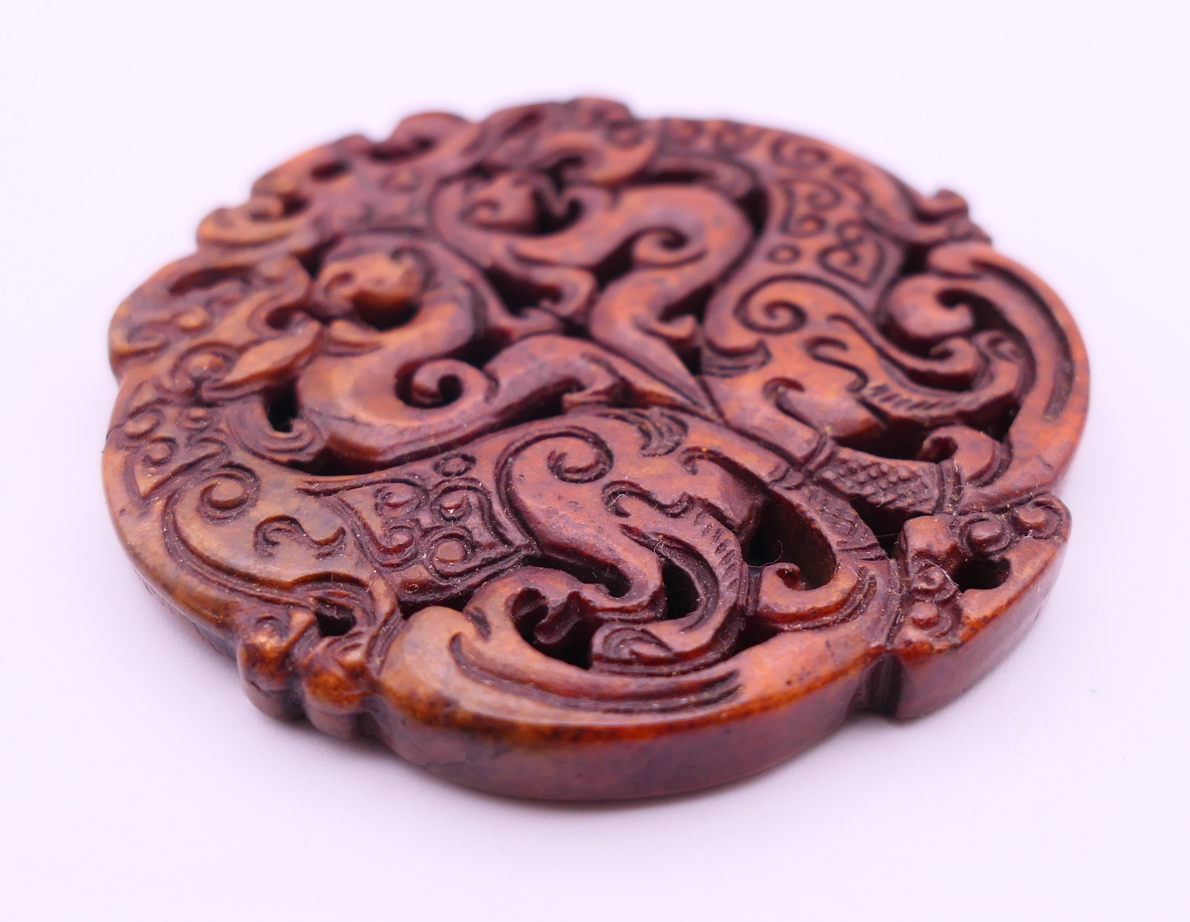 Three Chinese stone discs. The largest 7 cm diameter. - Image 6 of 10