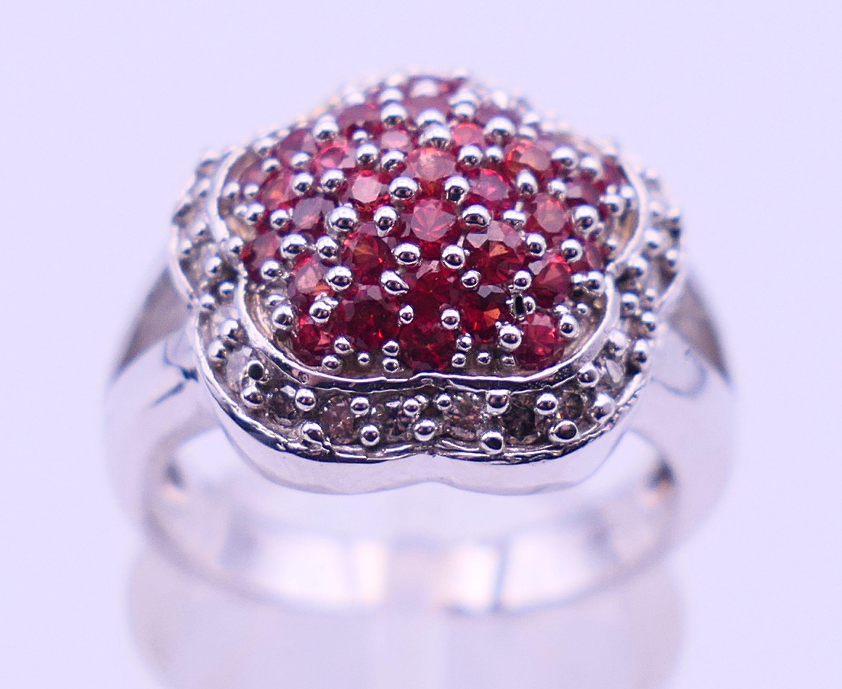 A 14 K white gold cluster ring. Ring size M. 8.1 grammes total weight. - Image 2 of 5