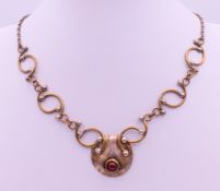 A Louis L Booth Arts and Crafts silver necklace. 36 cm long.