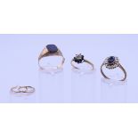 Two 9 ct gold rings, an unmarked gold signet ring and a pair of 9ct gold hoop earrings.