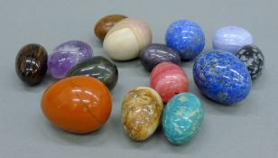 A collection of mineral eggs. The largest 4.5 cm high.