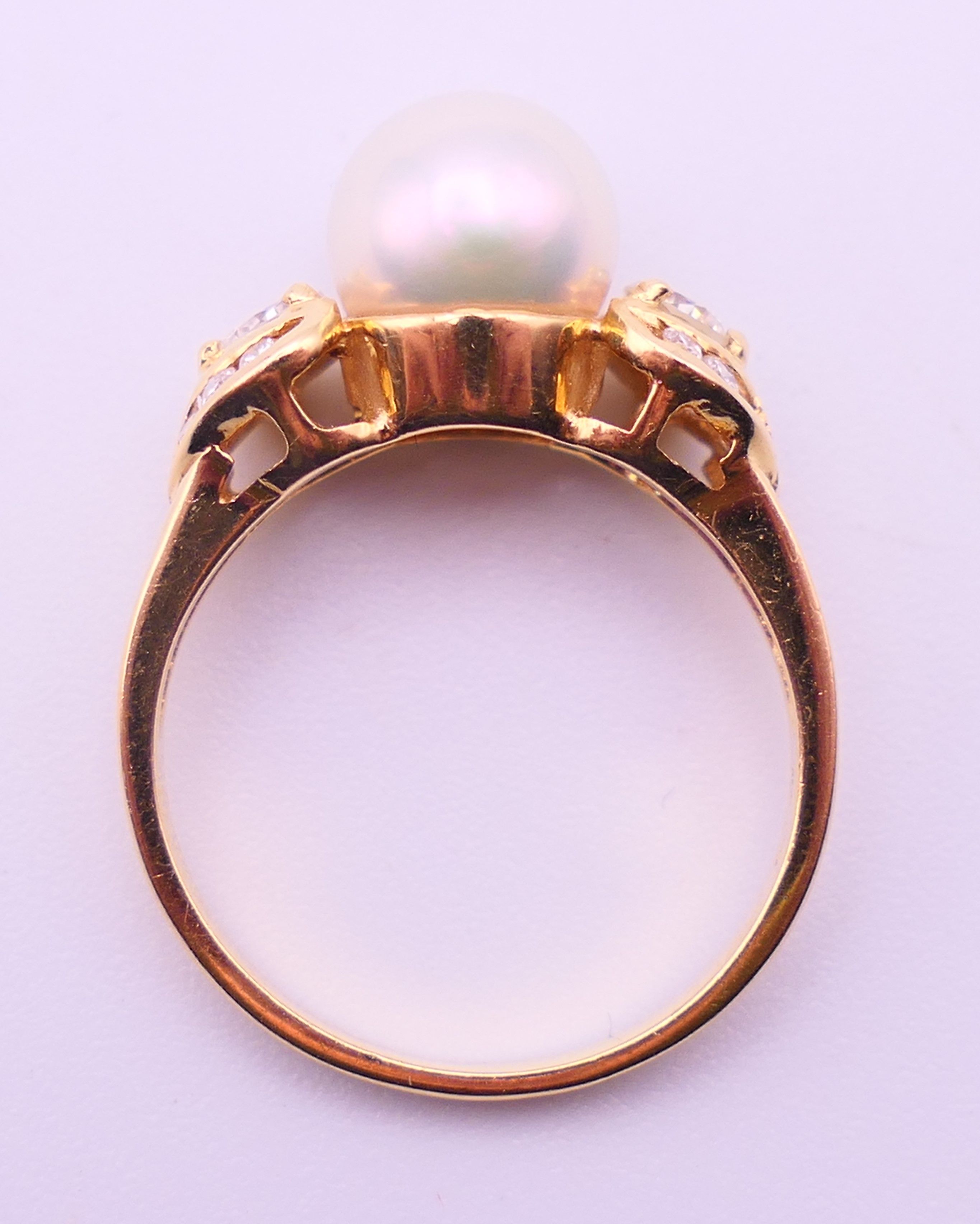 An 18 ct gold, diamond and pearl ring. Ring size L/M. 3.9 grammes total weight. - Image 5 of 5