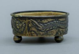 A Chinese silver salt with associated liner. 6.5 cm diameter. 46.6 grammes.