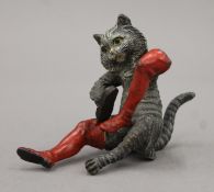A cold-painted bronze model of Puss in Boots. 7.5 cm high.