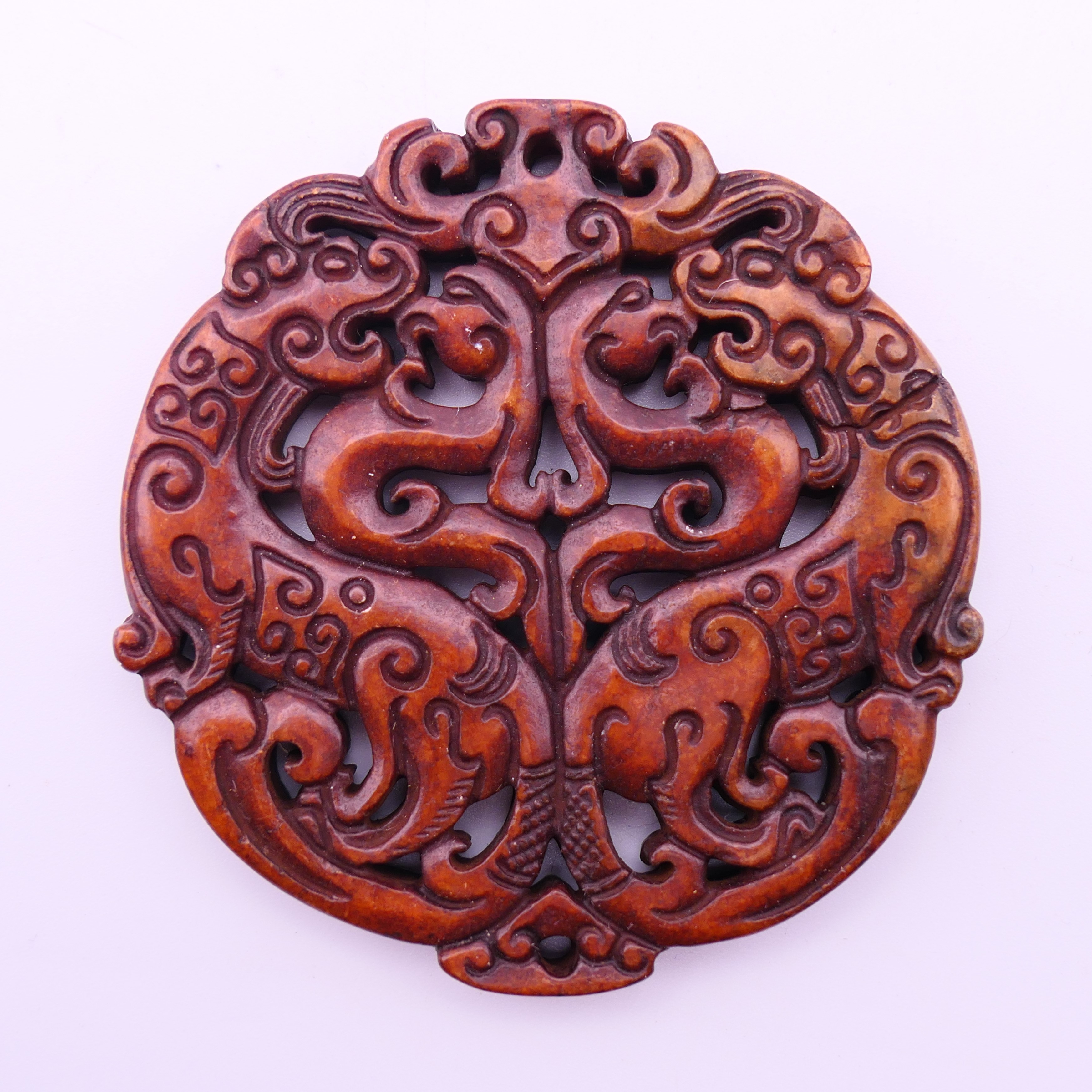 Three Chinese stone discs. The largest 7 cm diameter. - Image 7 of 10