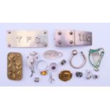 A small quantity of silver and other jewellery including an Art Nouveau brooch depicting Joan of