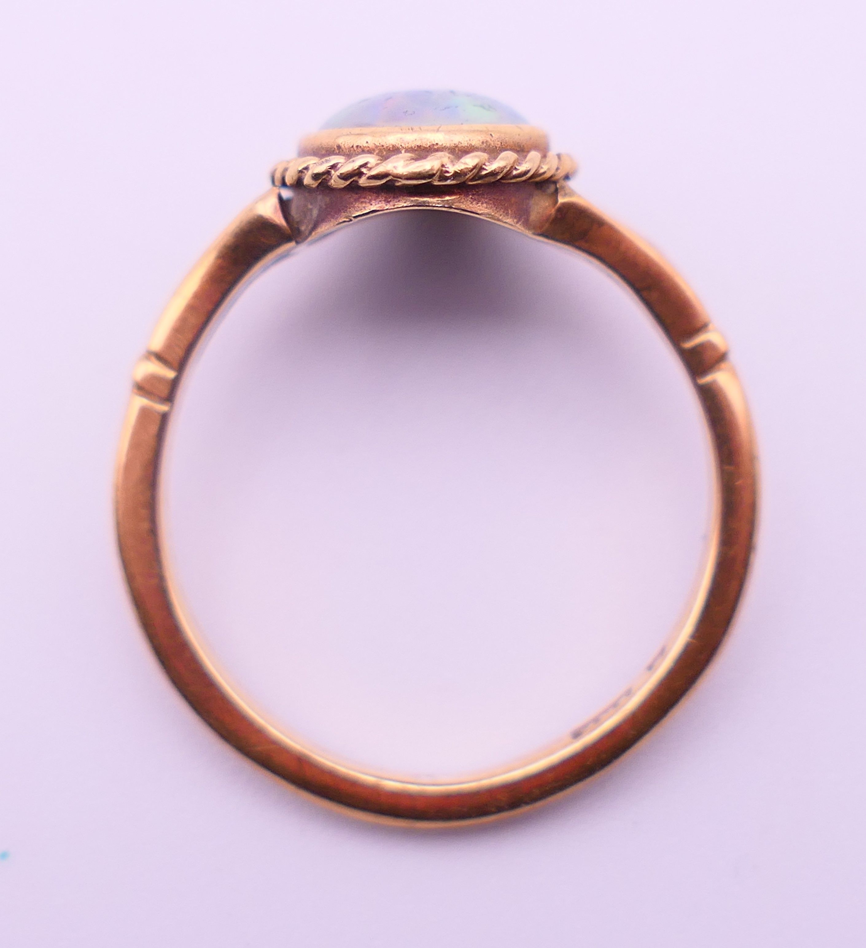 A 9 ct gold and black opal ring. Ring size T. 3.4 grammes total weight. - Image 5 of 5