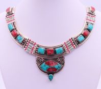 A Tibetan necklace. 40 cm long.