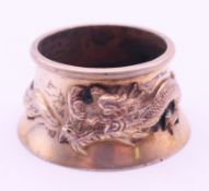 A Chinese silver dragon salt. 4.5 cm diameter, 2.25 cm high.