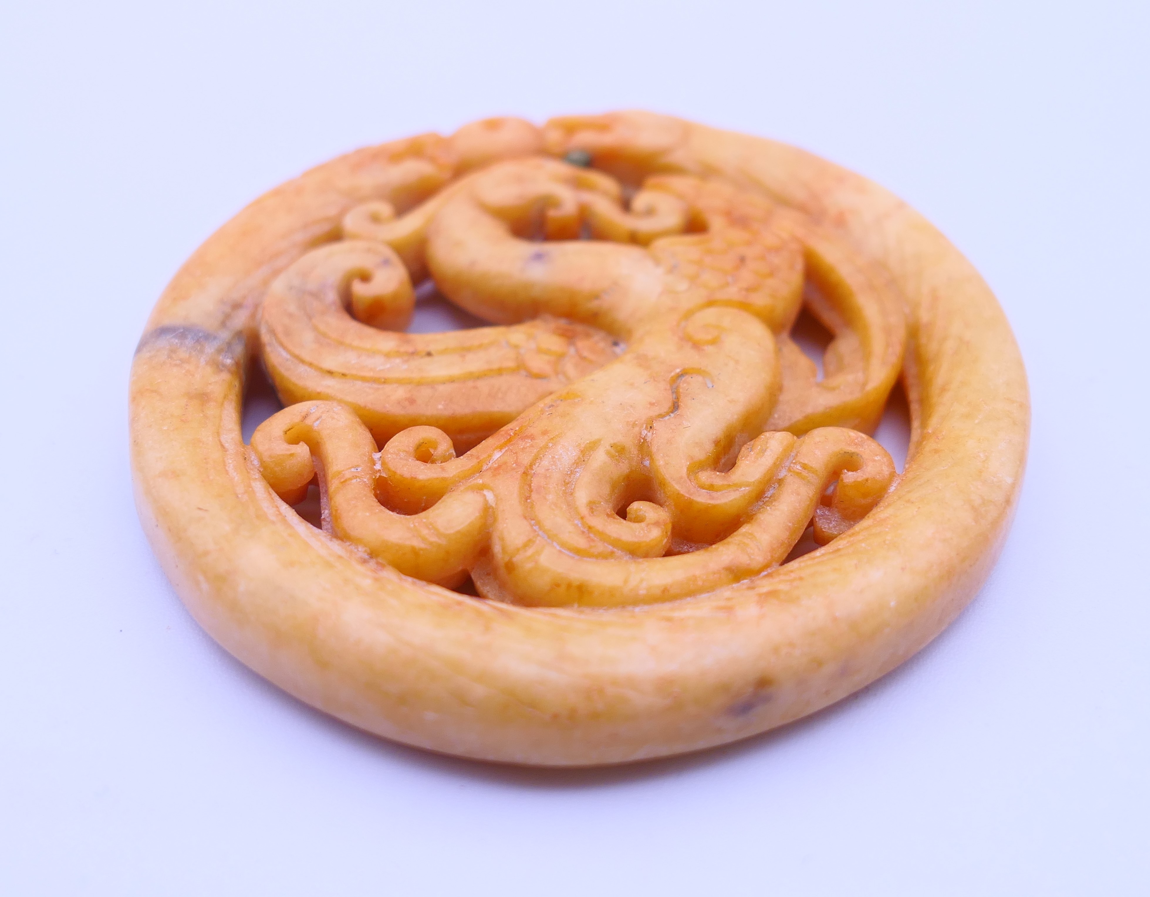 Three Chinese stone discs. The largest 7 cm diameter. - Image 3 of 10