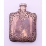 A Tiffany & Co sterling silver hip flask. 10 cm high.108.2 grammes.