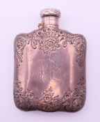 A Tiffany & Co sterling silver hip flask. 10 cm high.108.2 grammes.