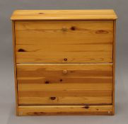 A modern pine shoe cupboard to fit 24 pairs of shoes. 80 cm wide.