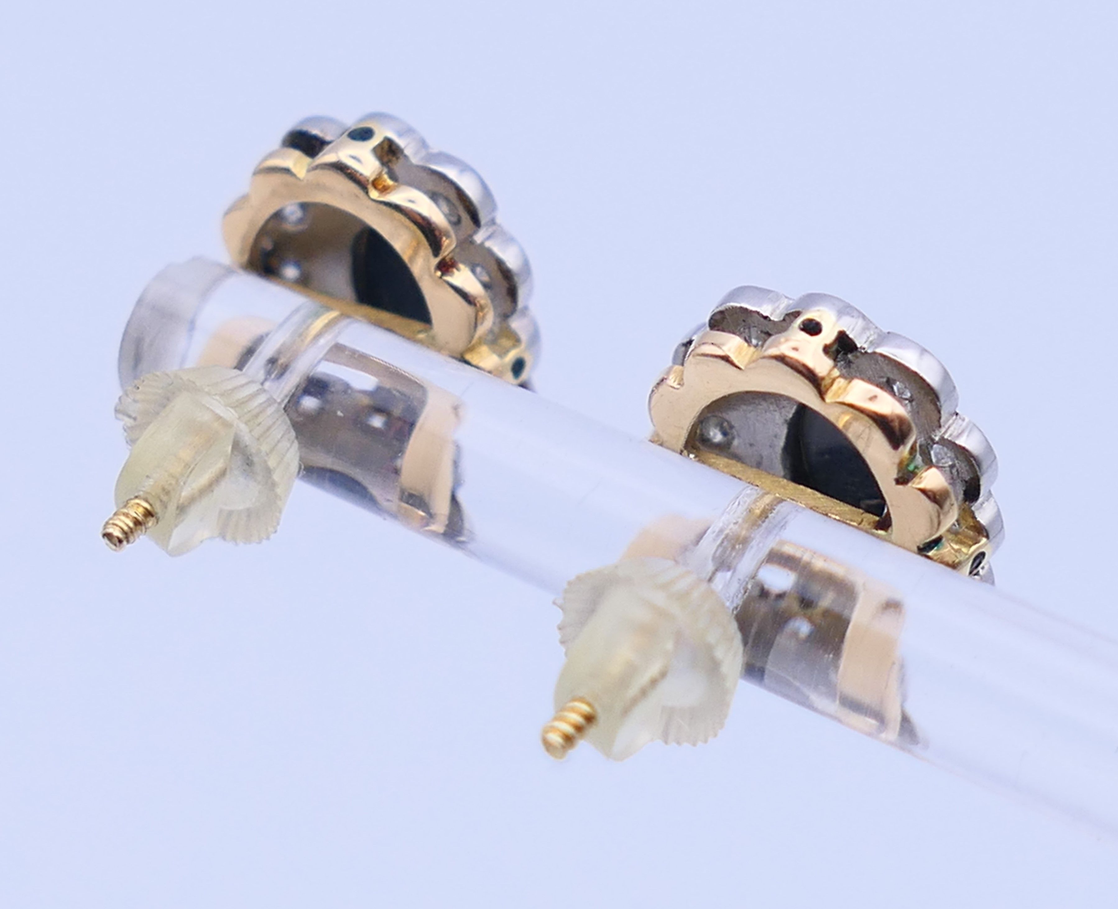 A pair of unmarked gold, diamond and opal earrings. 1.25 cm high. - Image 3 of 6