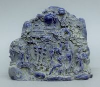 A Chinese model of a boulder carving. 18 cm wide.