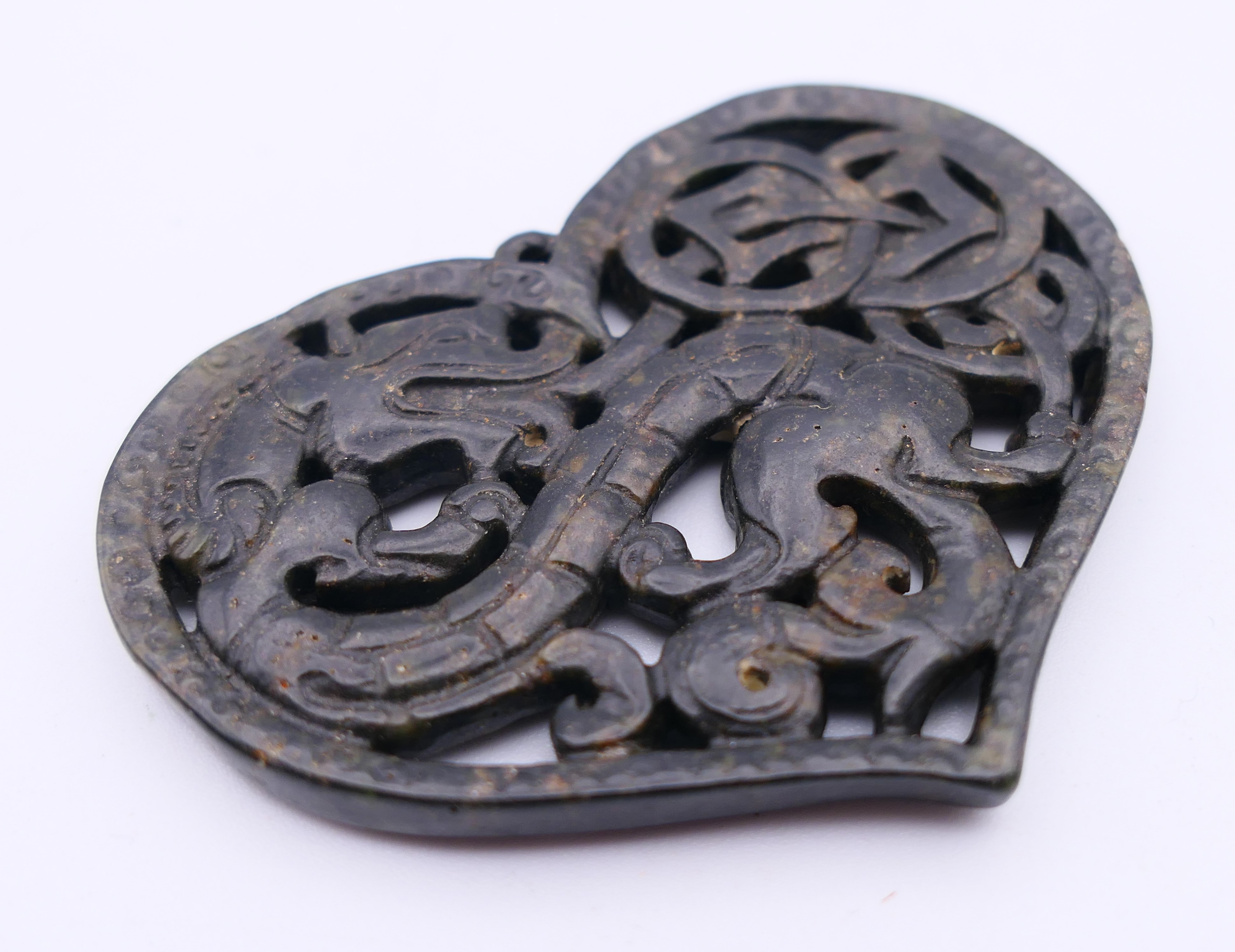 Three Chinese stone discs. The largest 7 cm diameter. - Image 9 of 10