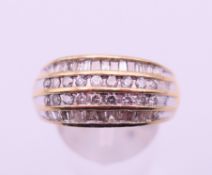 A 10 K gold multi-diamond channel set ring. Ring size P/Q. 7.5 grammes total weight.