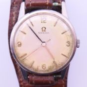 A stainless steel Omega gentlemen's wristwatch. 3.5 cm wide including crown.