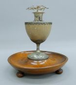 A white metal-mounted emu egg-form presentation trophy mounted on a wooden stand presented to Mr P