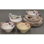 A Victorian porcelain tea set. The cups each 5 cm high.