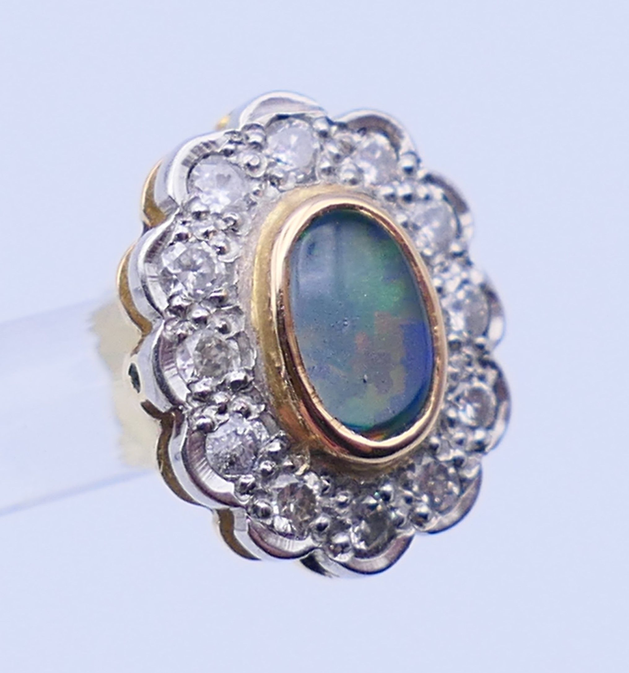 A pair of unmarked gold, diamond and opal earrings. 1.25 cm high. - Image 5 of 6