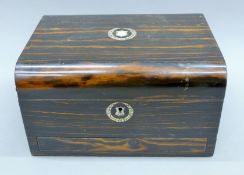 A Victorian mother-of-pearl inlaid coromandel travelling box. 30.5 cm wide.