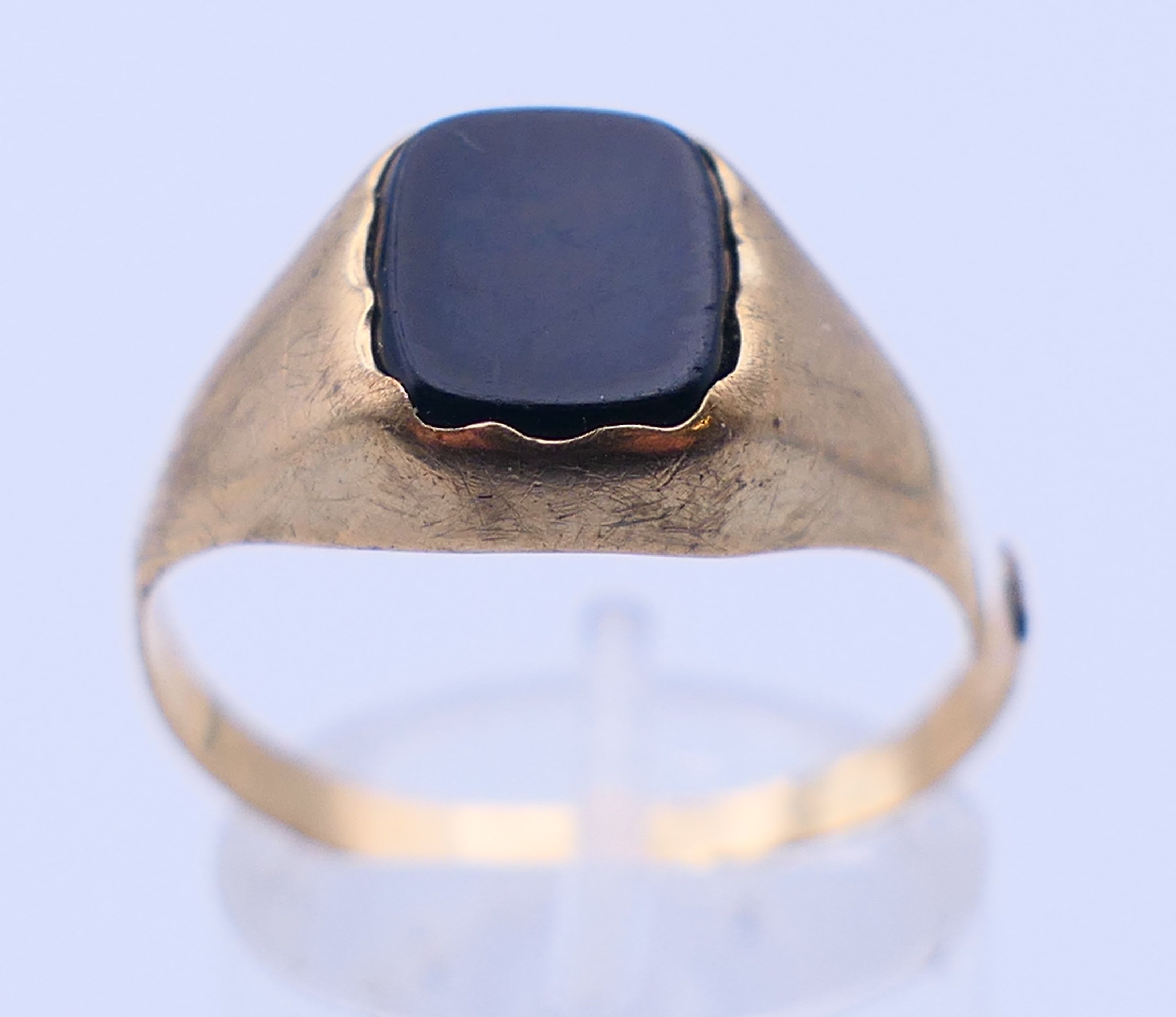 Two 9 ct gold rings, an unmarked gold signet ring and a pair of 9ct gold hoop earrings. - Image 13 of 19