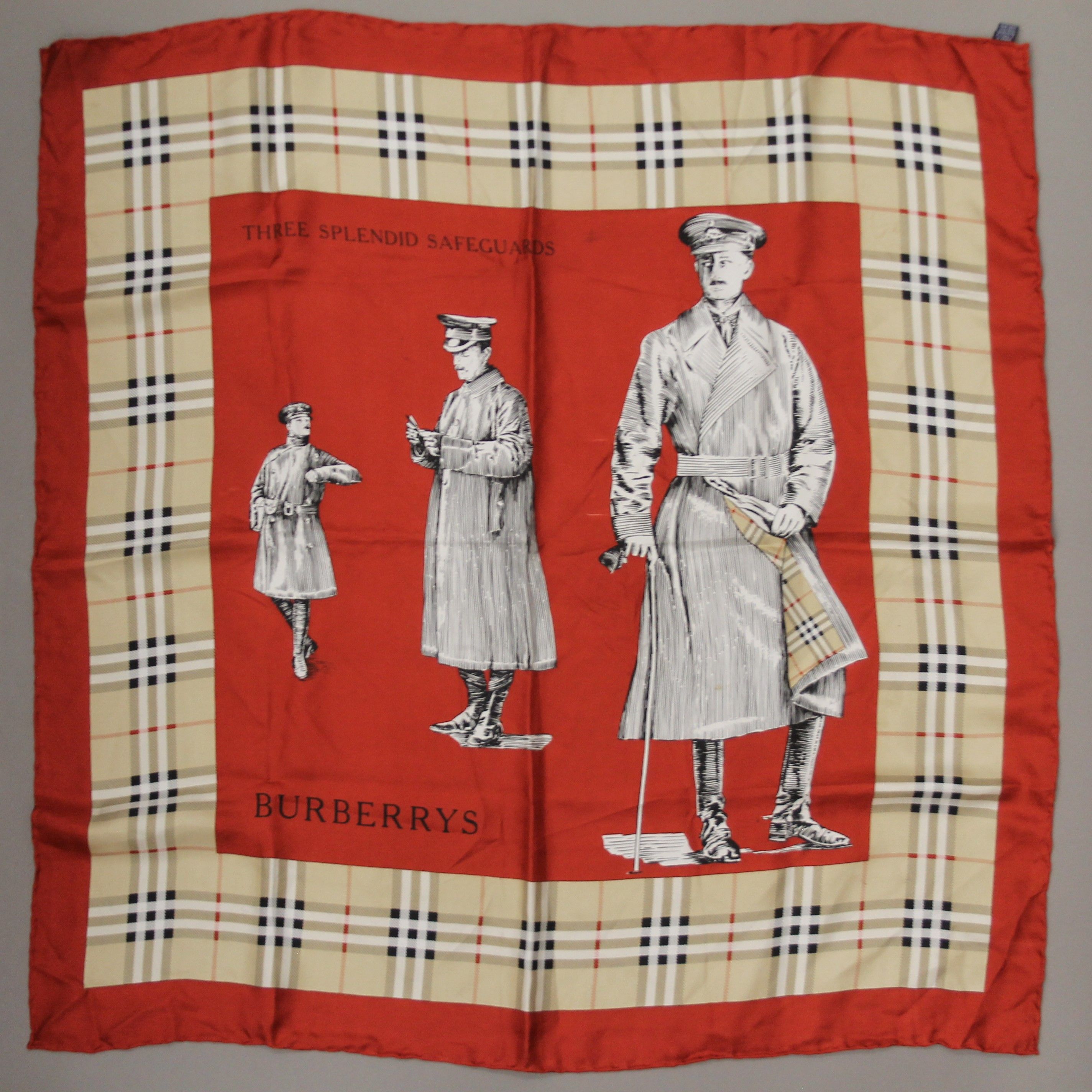A Burberrys vintage 'Three Splendid Guardians' printed silk square. Approximately 76 cm square.