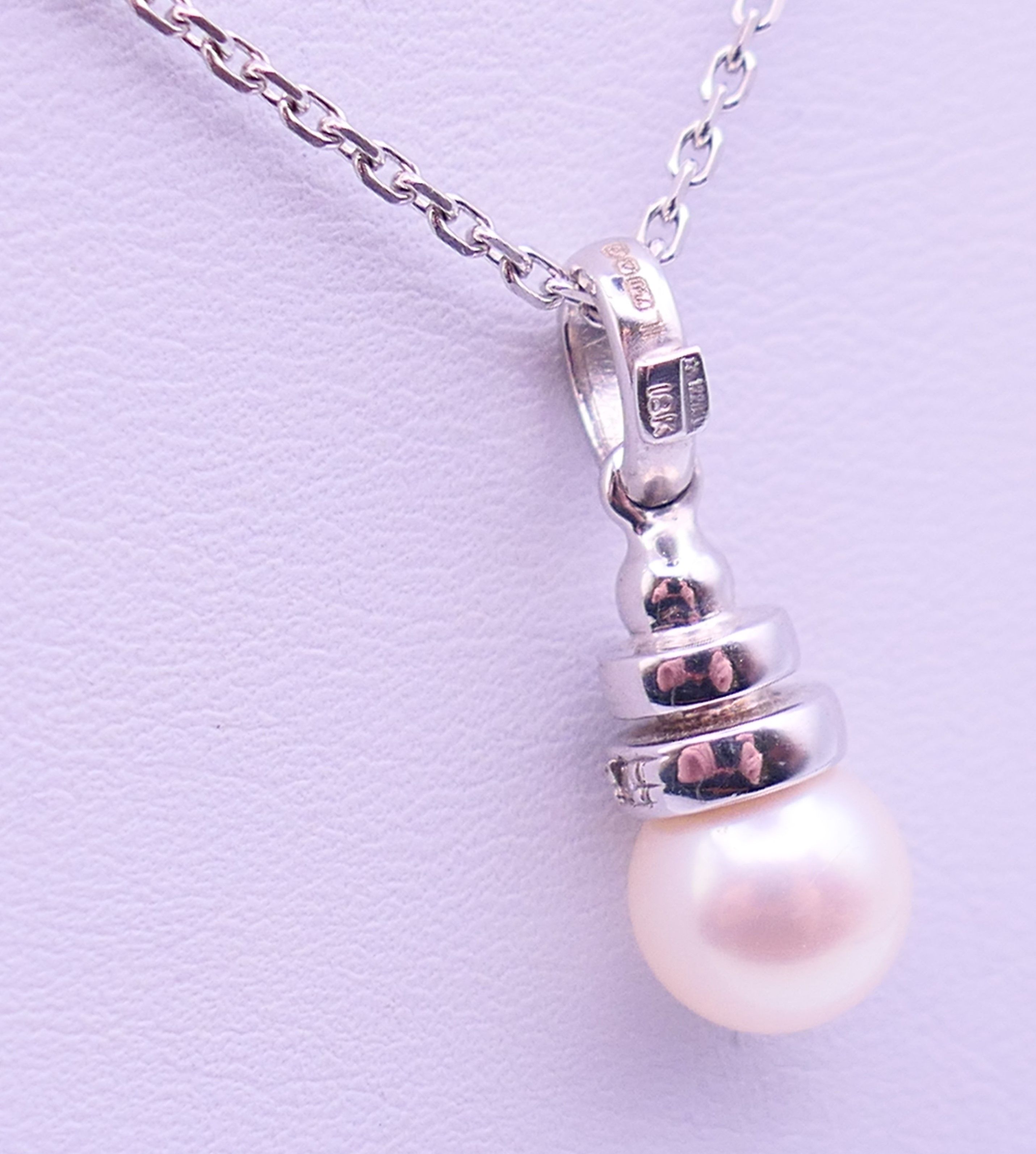 An 18 ct white gold, diamond and pearl drop pendant on a chain. Pendant 2. - Image 2 of 6