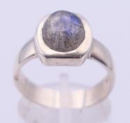 A silver dress ring. Ring size O/P.