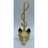 A brass fox mask door porter. 38 cm high.