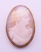A 9 ct gold mounted cameo brooch. 3.5 cm high.