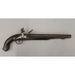 An antique flintlock pistol. 46 cm long.