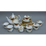 A Royal Albert Old Country Roses pattern porcelain tea set. The teapot 20 cm high.