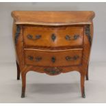 An early 20th century French bronze-mounted two-drawer bombe commode. 90 cm wide.