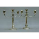 A pair of 800 silver twin-branch candelabras. Each 30 cm high. 1116.8 grammes.