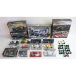 Collection of Formula 1 themed models to include twelve 1/43 diecast examples to include Corgi (2x