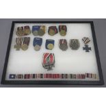 Framed collection of German WWI/II period military awards to incl. Iron Cross (1939) 2nd Class,