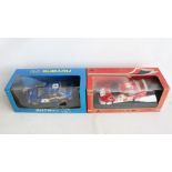 Two 1/18th scale diecast 2001 season WRC model cars from AutoArt to include 80193 Subaru Impreza #
