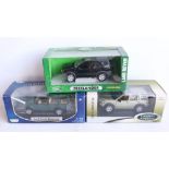 Three 1/18 scale diecast land Rover car models to include a Motor Max Discovery, an Ertl Grand