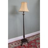 George 111 style mahogany floor lamp, brass sconce on slender fluted column, with turned circular